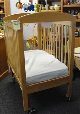 Picture of Generation 2 Worldwide SafetyCraft crib showing the clear plastic sides