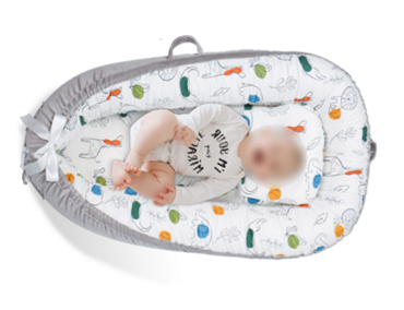 Recalled Cosy Nation Baby Lounger in Crocodile print