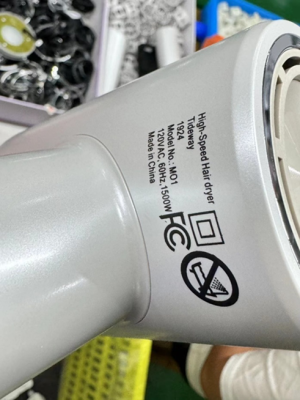 Label with model number M01 on recalled Tideway hair dryer