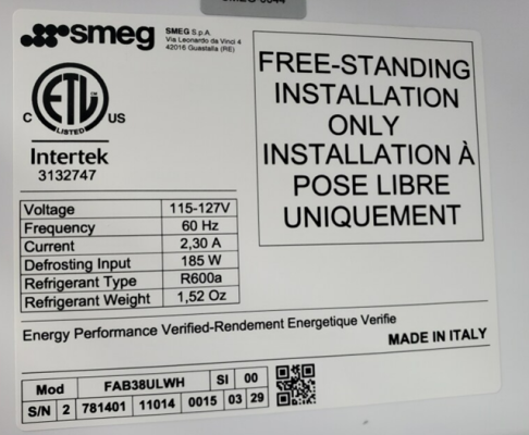 “Made in Italy”, the model, and serial numbers are printed on a white label inside of the refrigerator’s top door