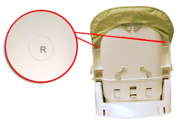 NOT Recalled: Feeding seats with an "R" stamped inside a raised circle located on the far left and right of the back of the seatback