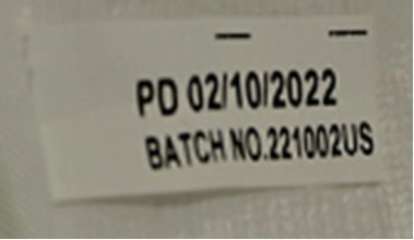 批号 221002US 以及该标签背面的生产日期