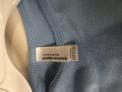 American Apparel and Baby Rib Colletion are printed on a neck label.