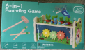 Recalled 6-in-1 Pounding Game Sold by Dmitoy (Front of Box)