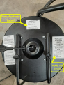 Manufacturer’s name and model number labels located underneath recalled Adjustable Swivel Shop Stool seat